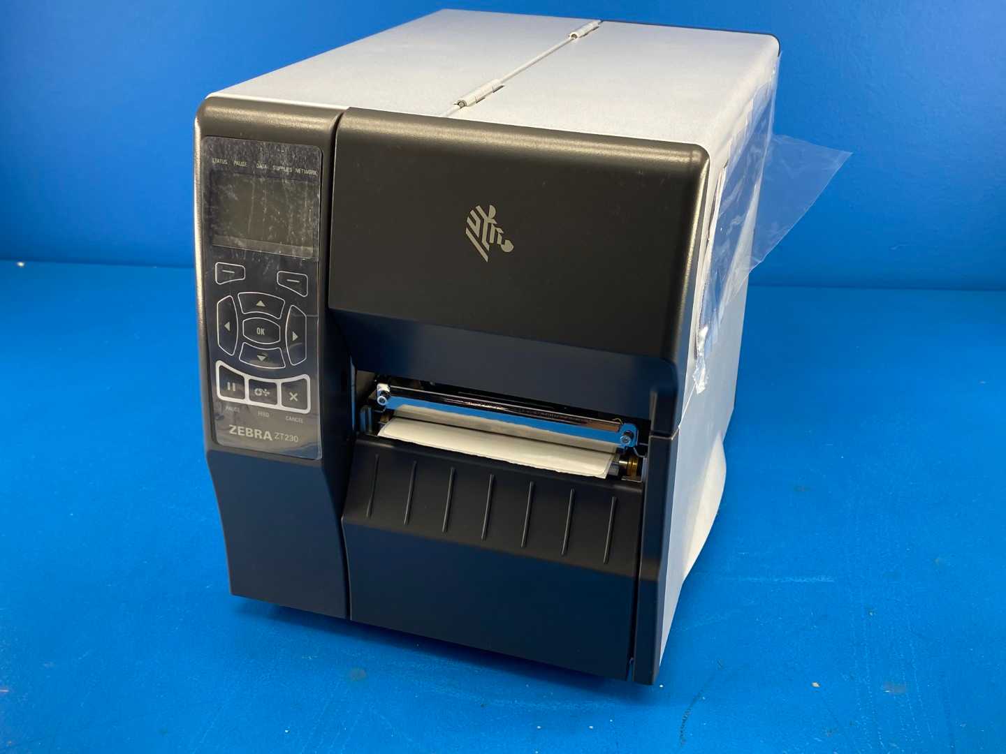 Zebra ZT230 Thermal Transfer and Direct Thermal Industrial Monochrome Barcode Label Printer 4" Print Width, 203 DPI